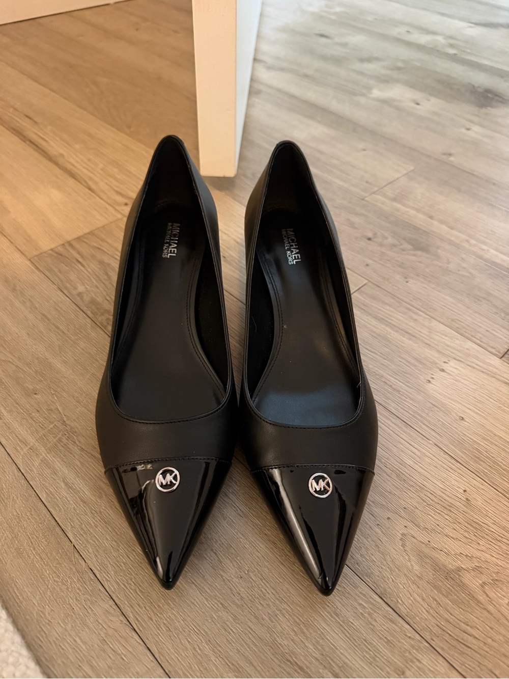 MICHAEL Michael Kors Black Pointed Toe Pumps with MK Emblem